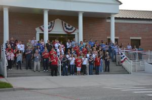FDOT's District Two Northeast Florida employees at Lake City’s district office gather at 8:46 a.m. on September 11, 2015 to remember the events of 9/11. 